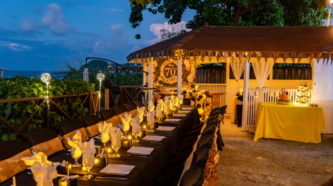 A seaside celebration glowing at night