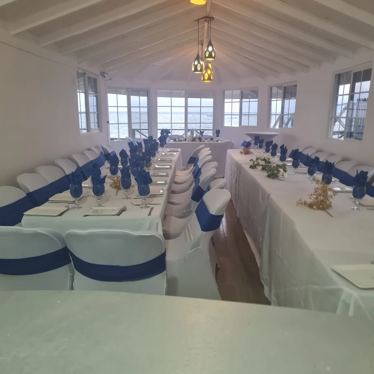 Gather around the table at Sky Beach Jamaica