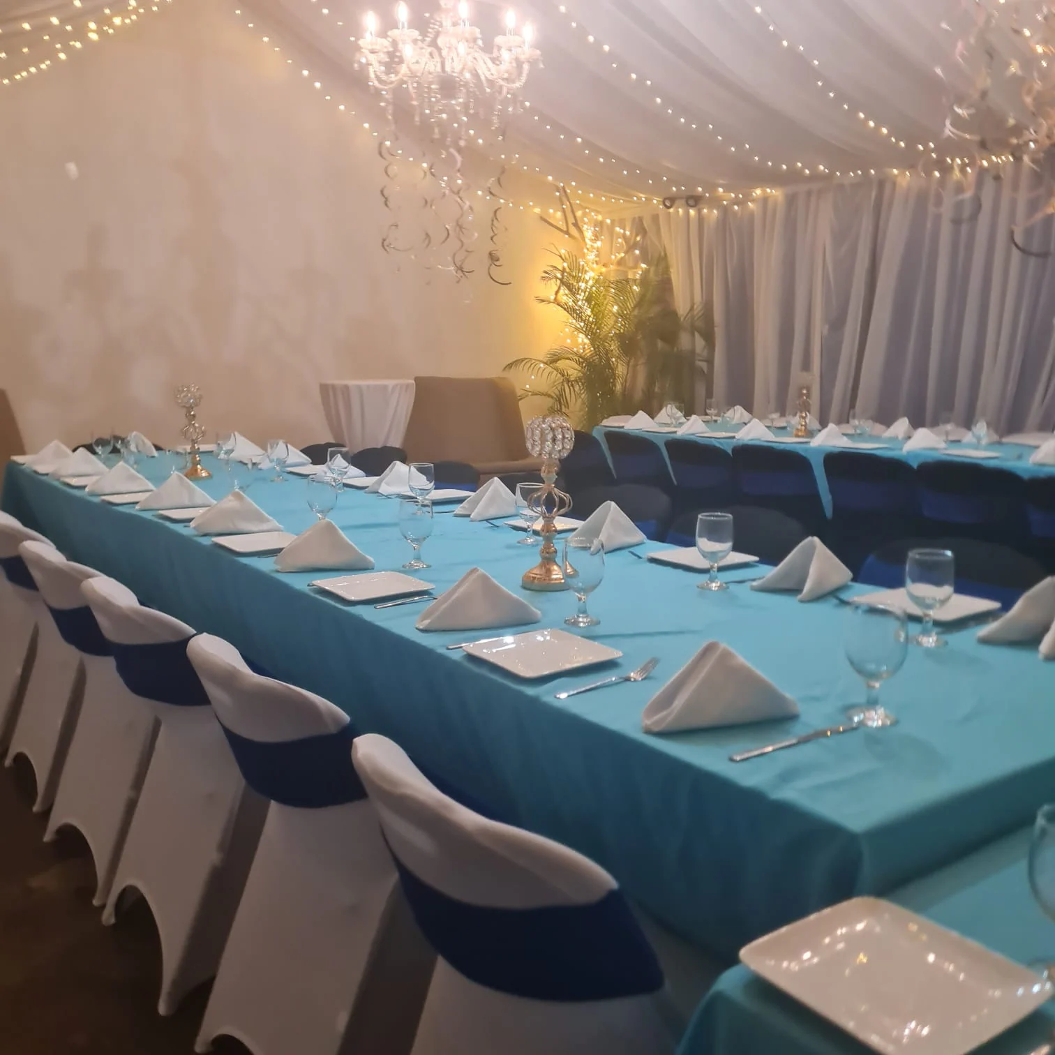 Gather around the table at Sky Beach Jamaica