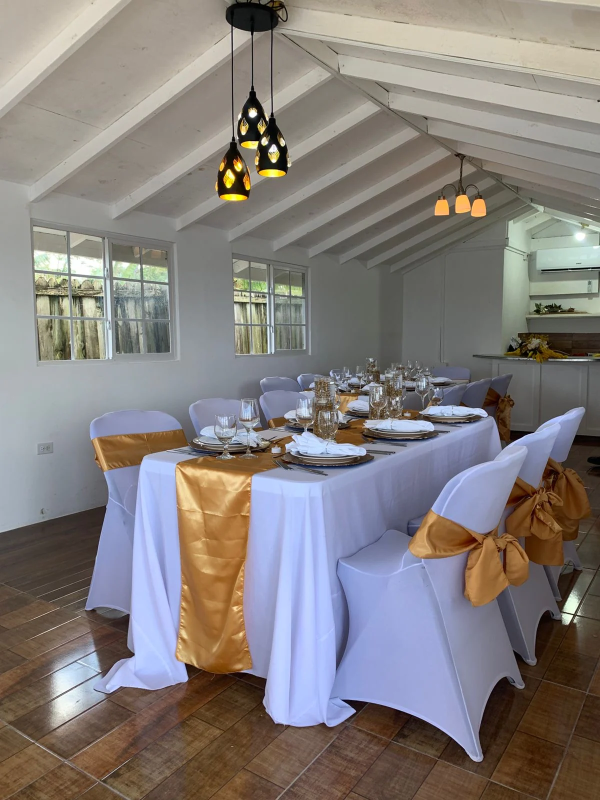 Gather around the table at Sky Beach Jamaica