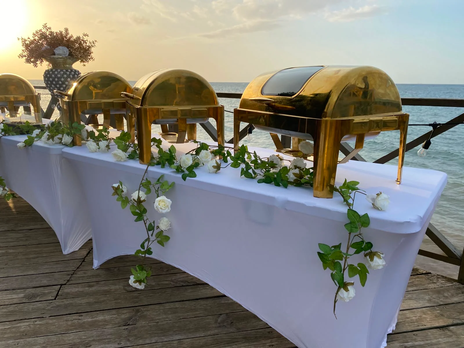 Gather around the table at Sky Beach Jamaica