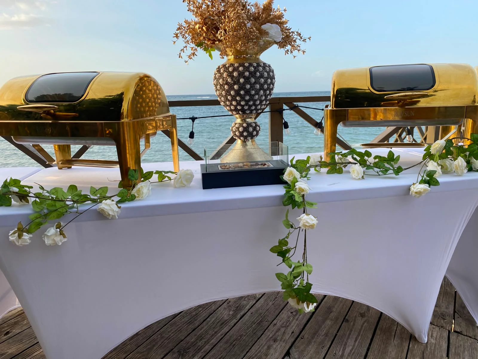 Gather around the table at Sky Beach Jamaica