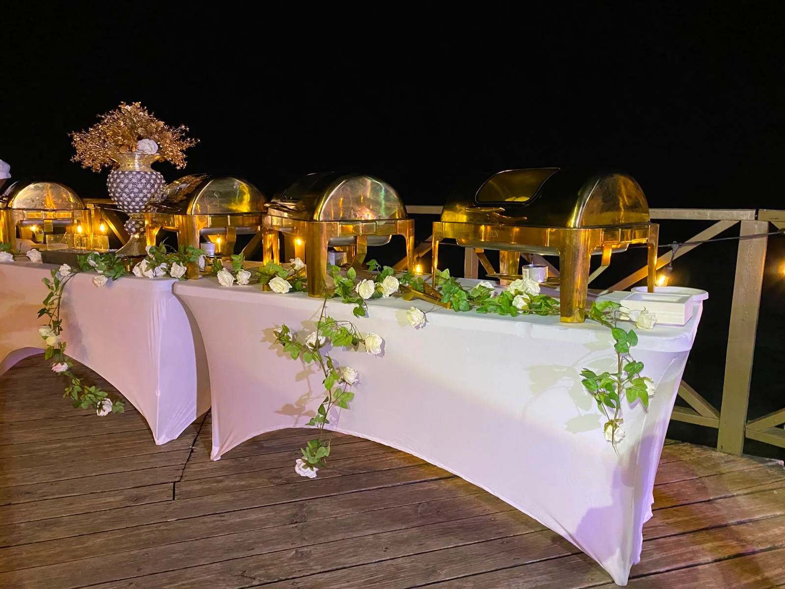 Gather around the table at Sky Beach Jamaica