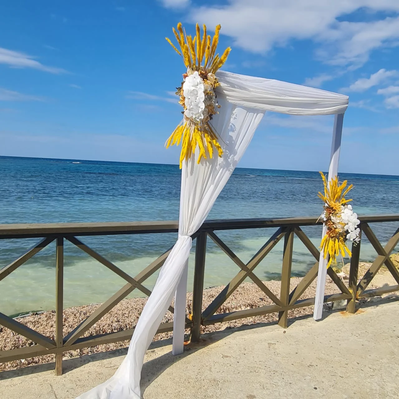 Gather around the table at Sky Beach Jamaica