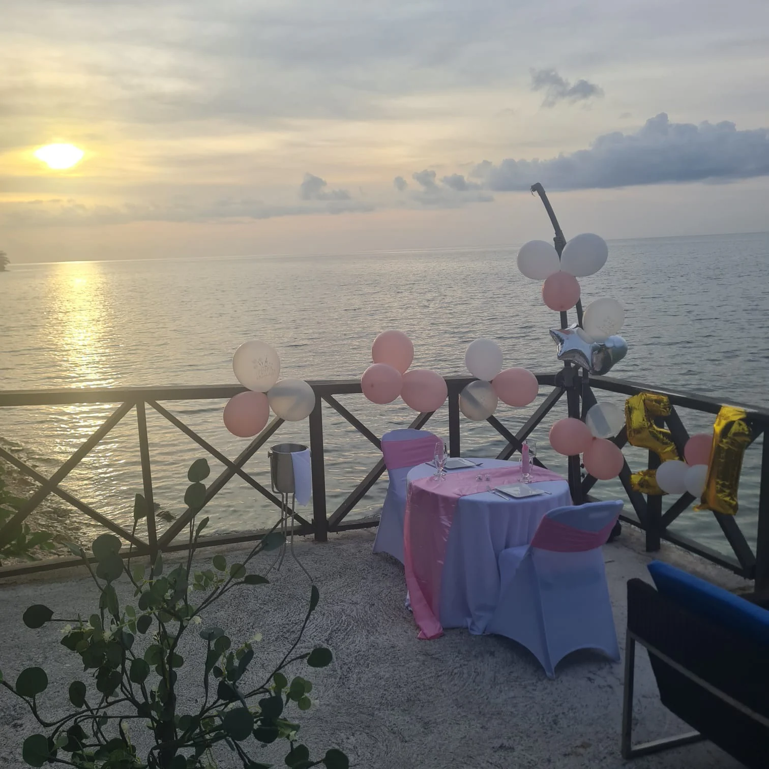 Gather around the table at Sky Beach Jamaica